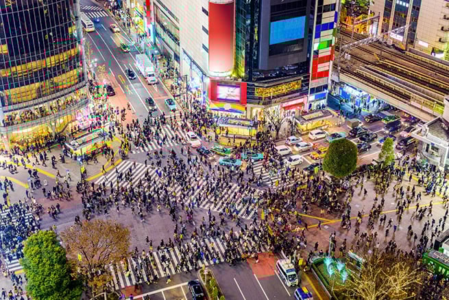 time square with a large number of people walking around