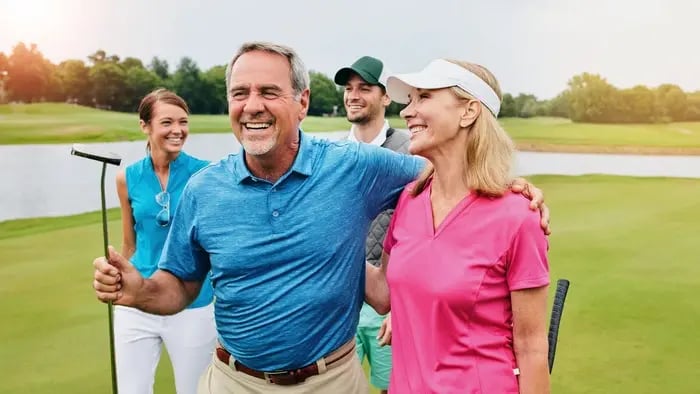 family golfing