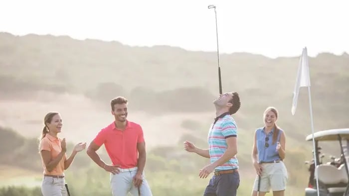 golfers goofing off